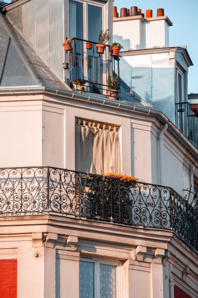 black metal fence near white concrete building scaled e1734896882248